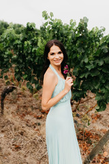 Portrait of a beautiful bride in a turquoise dress.