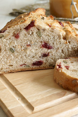 Cranberry bread baked with pumpkin and sunflower seeds