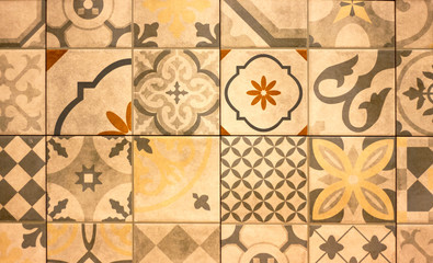 wall of multicolored tiles with ethnic patterns pottery retro