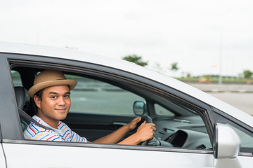 Young asian man driving car. Relaxing, Holiday, Activities, travel, Insurance agent concept.