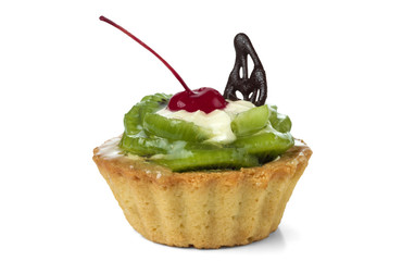 Colorful fruit cakes with kiwi, candied cherry, cream and chocolate isolated on white background.