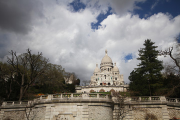 Sacre Coeur Basilica Church with Blue cloudy sky Backgrounds at Montmartre Hill, Paris France, White stone church, Sightseeing place, attractive, Travel destinations