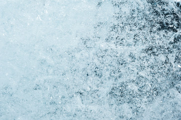Fototapeta na wymiar Ice with bubbles background texture. Refreshing summer drinks or arctic cold concept.