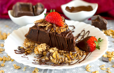 slice of chocolate cake with muesli