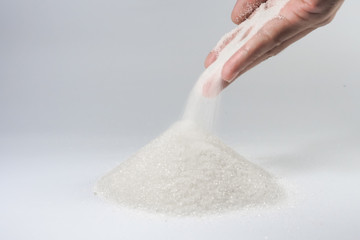 hand with sugar
