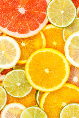 Citrus fruits collection food background oranges lemons limes portrait format grapefruit fresh fruit