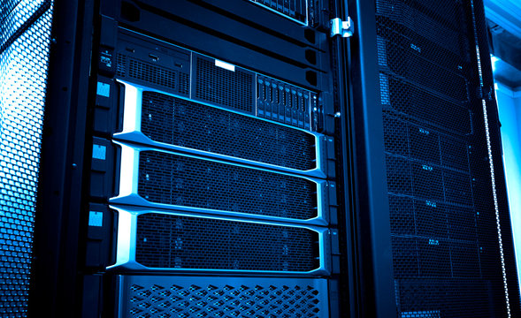 Close up cloud storage system panel modern with hard drives blue ton