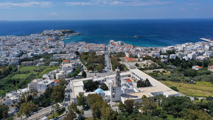 Obraz premium Aerial drone panoramic photo of iconic orthodox church of Lady of Tinos island or Church of Panagia Megalochari (Virgin Mary), Cyclades, Greece