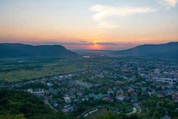 Beautiful view of the city, mountains and sunset.