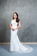 Fototapeta na wymiar Beautiful woman in wedding dress , Bride Thai style fashion