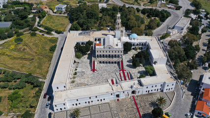 Aerial drone panoramic photo of iconic orthodox church of Lady of Tinos island or Church of Panagia Megalochari (Virgin Mary), Cyclades, Greece