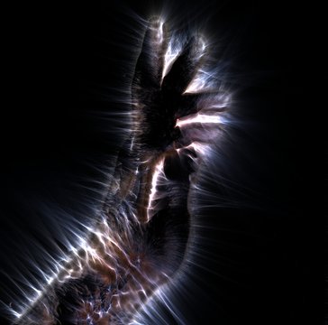 Glowing kirlian aura photography of a human male hand showing different signs and symbols