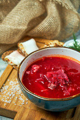 Red soup. Beautiful serving dishes. Restaurant menu