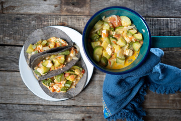 Mexican zucchini stew  tacos with blue tortilla