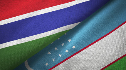Gambia and Uzbekistan two flags textile cloth, fabric texture