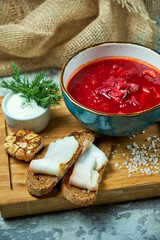 Red soup. Beautiful serving dishes. Restaurant menu