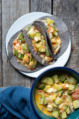 Mexican zucchini stew  tacos with blue tortilla