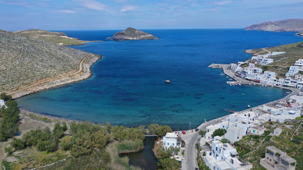 Fototapeta na wymiar Aerial drone photo of picturesque beautiful fishing village and small harbour of Panormos, Tinos island, Cyclades, Greece