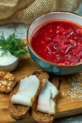 Red soup. Beautiful serving dishes. Restaurant menu