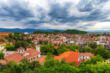 Fototapeta na wymiar Spring afternoon in Plovdiv city, Bulgaria. European capital of culture 2019 and the oldest living city in Europe. Photo from one of the hills in the city.