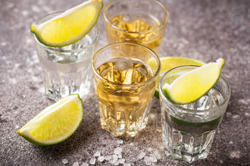 Shots of silver and gold tequila