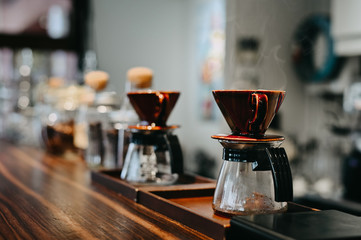 Drip coffee a roll of pot of coffee with vintage tone filter.