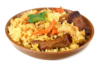pilaf with meat on brown plate isolated on white background.