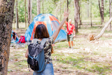 Young backpacker come to the camping location.