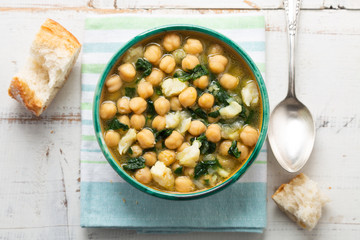 Chickpea stew with spinach and dry salted cod