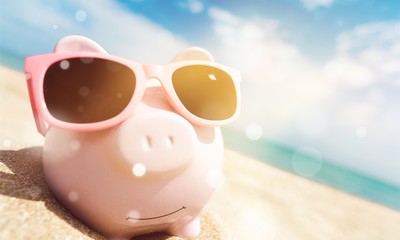 Piggy Bank Wearing Sunglasses Relaxing At The Beach