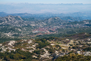 Fototapeta na wymiar Panoramic view from Lovcen mountain, Cetinje city in the distance. Montenegro.