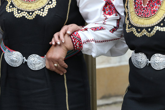 Gara Bov, Bulgaria - May 4, 2019: People dressed with traditional Bulgarian authentic folklore clothes dance Bulgarian horo in Gara Bov, Bulgaria