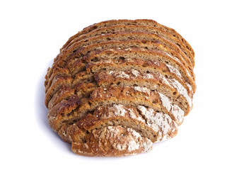 Sliced dark bread on a white background