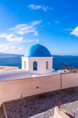 aegean; architecture; aspronisi; beach; beautiful; bell; blue; building; caldera; catholic; chapel; church; cliff; cross; cyclades; destination; dome; europe; fira; greece; greek; hill; holidays; hous