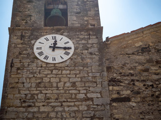 medieval church bell tower with clock
