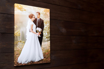 Photo canvas print. Sample of stretched wedding photography with gallery wrap, side view. Bridal...