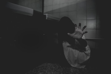 Portrait of asian woman make up ghost face with blood,Horror scene,Scary background,Halloween...
