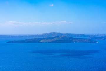 Santorini landscape - view of vast volcano caldera filled with water, Greece