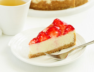 Classic cheesecake with fresh strawberries. Selective focus.