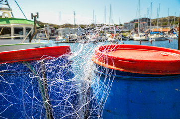 Idyllic Barrels with fishnet in Skärhamn, Sweden