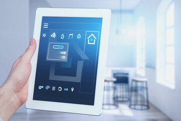 Man with tablet, smart home interface in kitchen