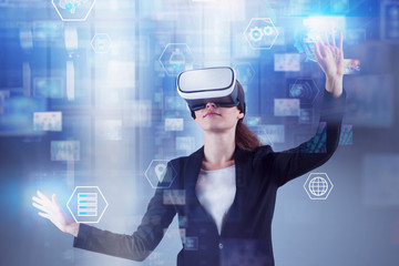 Woman in VR headset, information interface
