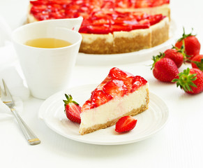 Classic cheesecake with fresh strawberries. Selective focus.