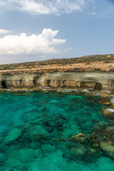 Picturesque sea caves are located on the Mediterranean coast.