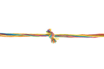 Colorful knot of cotton thread isolated on white background. Thread line with knot made of...