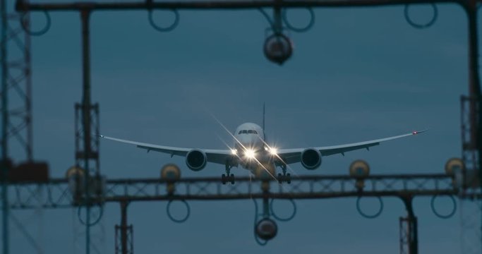Cinematic shot of a passenger jet airplane about to land