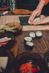 The process of making sushi from natural ingredients is a professional chef in the restaurant