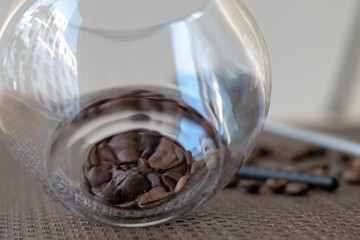 Obraz na płótnie Canvas coffee beans in a glass
