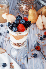 Granola with yogurt pear and berries
