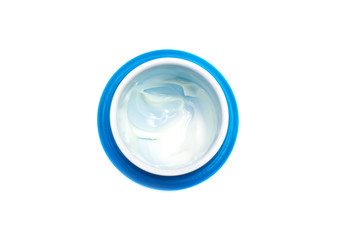 Blue can with cream close-up, isolated on white 